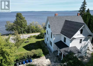 620 Lakeshore property in Temiskaming Shores is for sale. Known as the Villa of the President's Suites